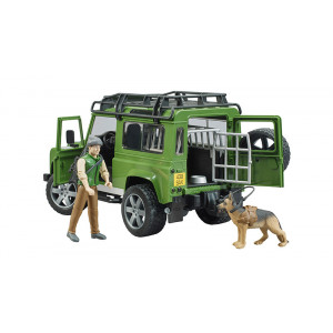 Land Rover Defender Station Wagon avec forestier et chien